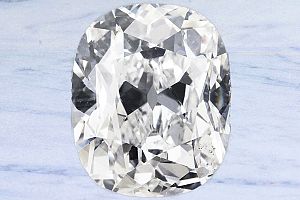 3.33 Antique Cushion Old Mine Diamond - GIA J/SI1+ 