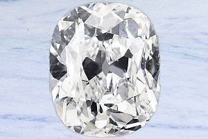 3.33 Antique Cushion Old Mine Diamond - GIA J/SI1+ 