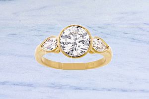 2.30 CaratTW IDEAL Cut Round Brilliant and Pear Shape Diamond Engagement Ring - 18K Yellow Gold Yellow Gold Bezel