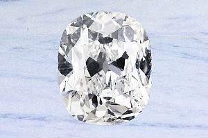 3.33 Antique Cushion Old Mine Diamond - GIA J/SI1+ 