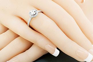 1.06 Carat TW Round Brilliant Diamond Engagement Ring