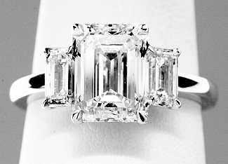 4.01 Carat GIA Three-Stone Emerald Cut Diamond - Platinum Engagement Ring  