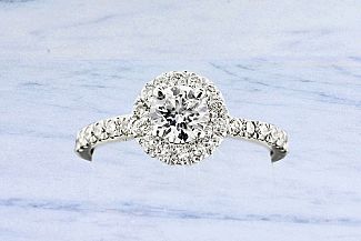 1.06 Carat TW Round Brilliant Diamond Engagement Ring