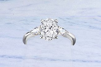 1.55 Carat TW GIA OVAl and PEAR SHAPE Diamond Ring - Platinum 
