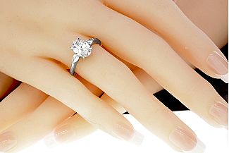 1.76 Carat TW GIA OVAL and PEAR SHAPE Diamond Ring - Platinum